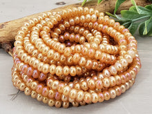 Load image into Gallery viewer, Mystic Apricot Shimmer - Smooth Glass Rondelle - 4mm - 15&quot; Strand
