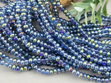 Load image into Gallery viewer, Luminous Blue Purple - Smooth Glass Rondelle - 4mm - 15&quot; Strand
