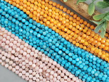 Load image into Gallery viewer, Vivid Orange Faceted Shell Beads - 4mm - 15&quot; Strand
