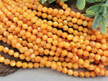 Charger l&#39;image dans la galerie, Vivid Orange Faceted Shell Beads - 4mm - 15&quot; Strand
