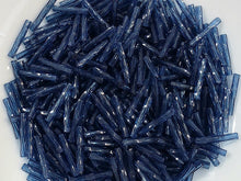 Load image into Gallery viewer, Montana Blue Transp. - Twisted Myuki Bugle Beads - 12x2mm - 10grams
